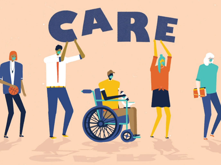 Several teachers hold up the word, 'Care'